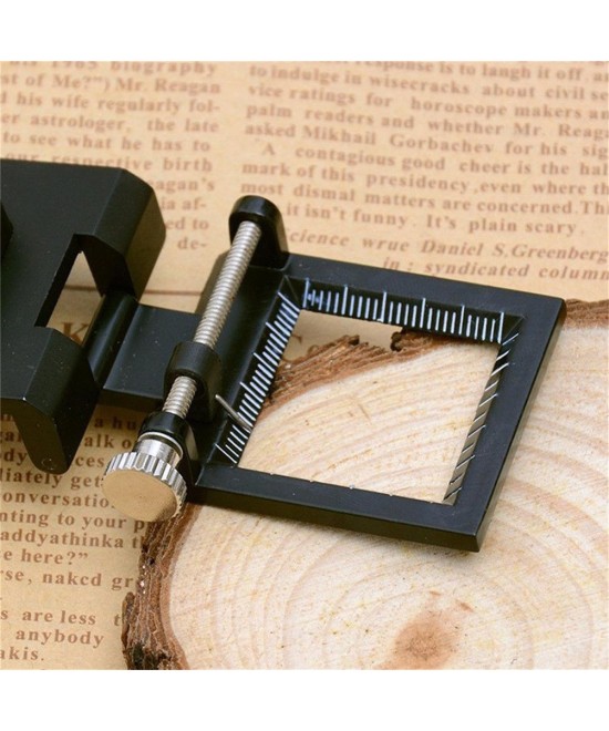 Lupa pequeña con base de metal