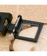 Lupa pequeña con base de metal