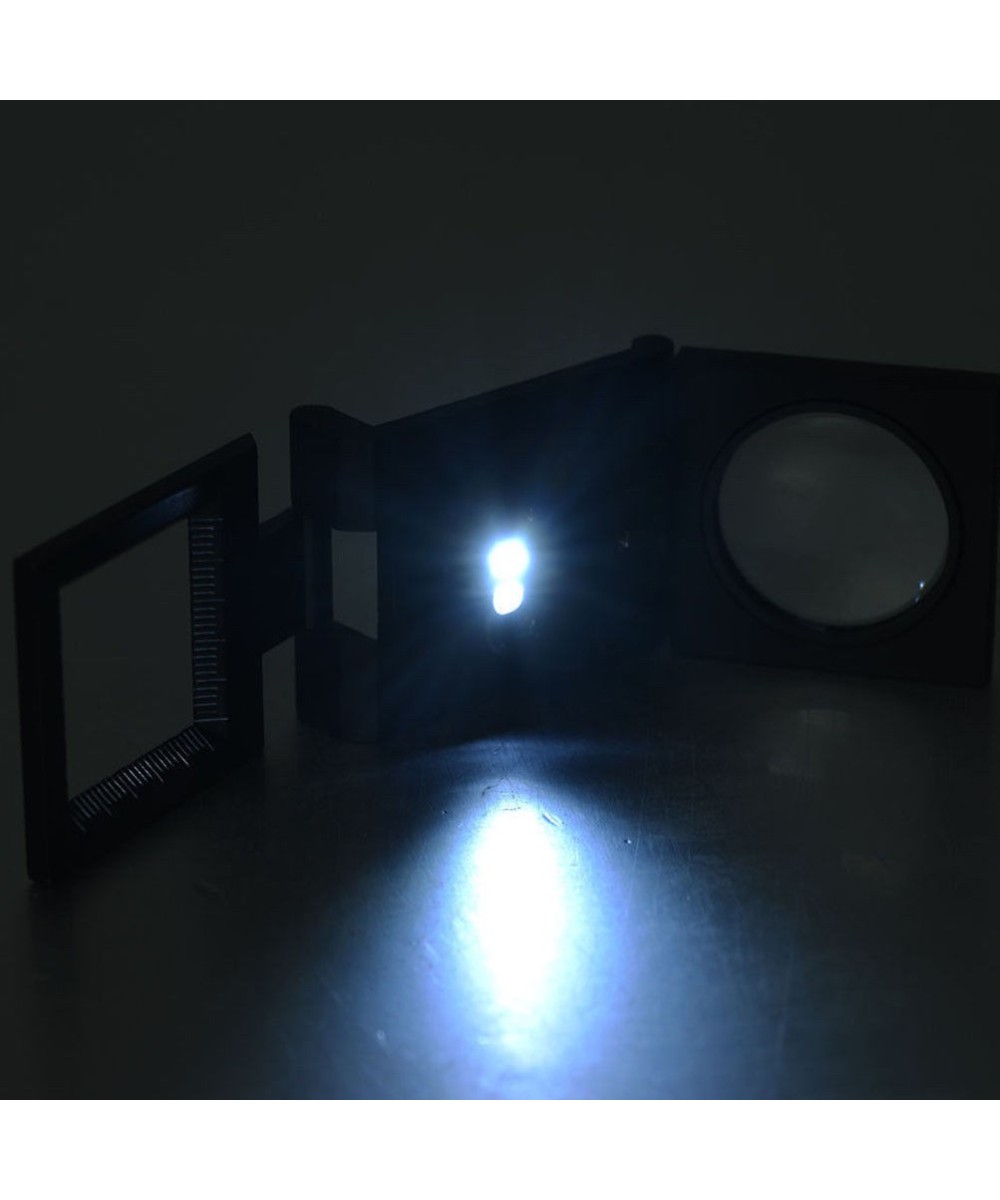 Lupa pequeña con base de metal