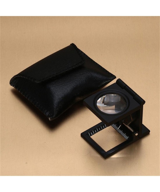 Lupa pequeña con base de metal