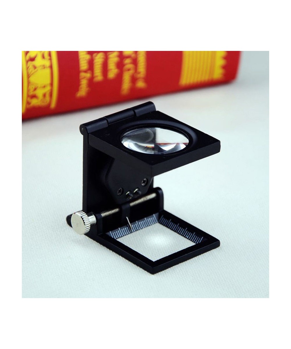 Lupa pequeña con base de metal