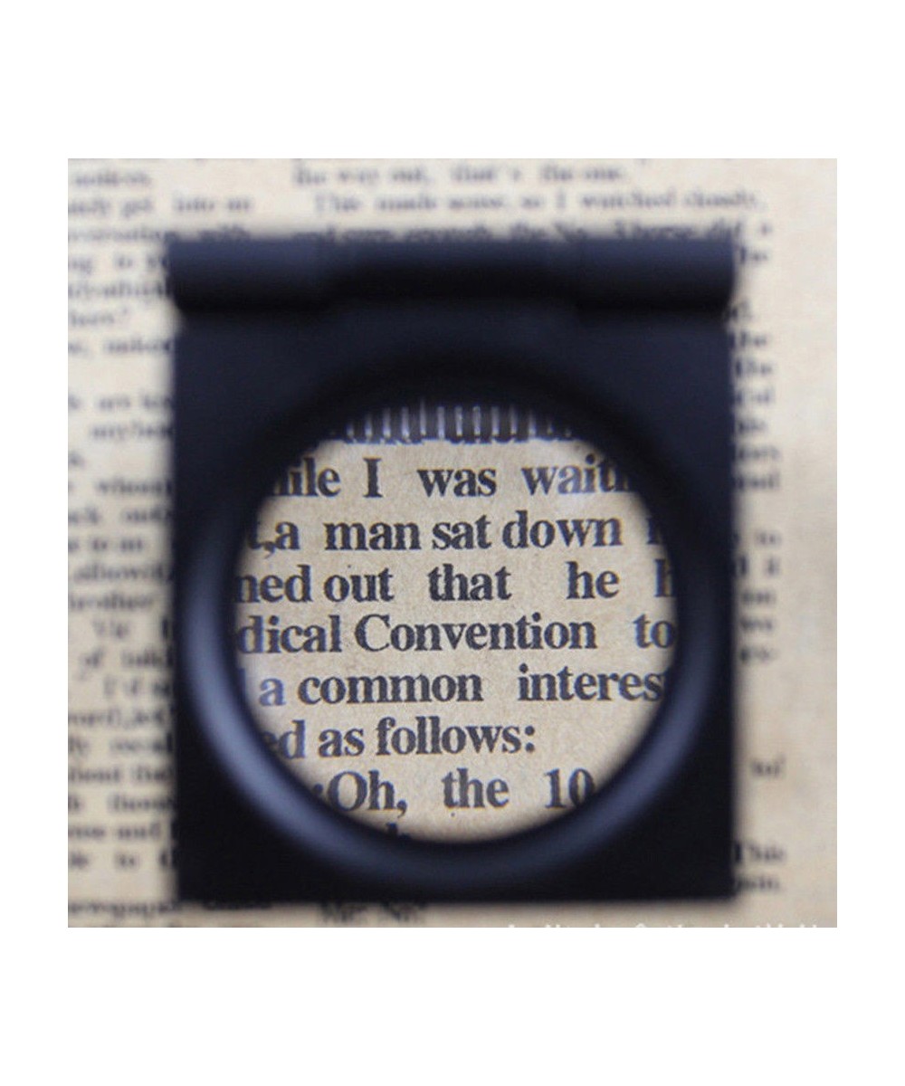 Lupa pequeña con base de metal