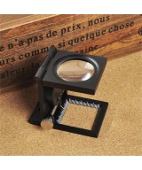 Lupa pequeña con base de metal